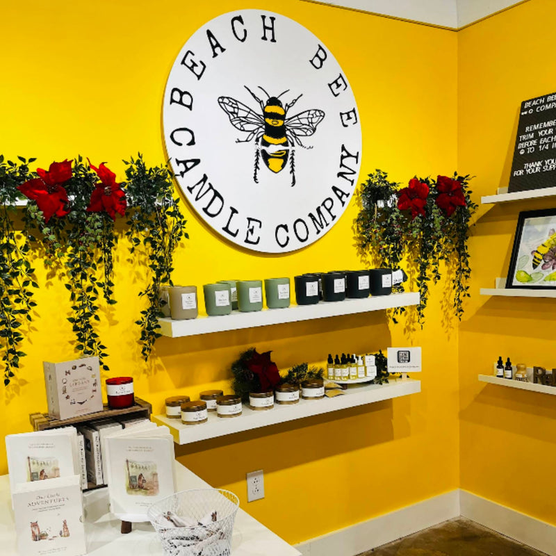 Beach Bee storefront at the Painted Tree Boutique on Laskin Rd in Virginia Beach. Beeswax and coconut oil candles. All natural perfume oils. 